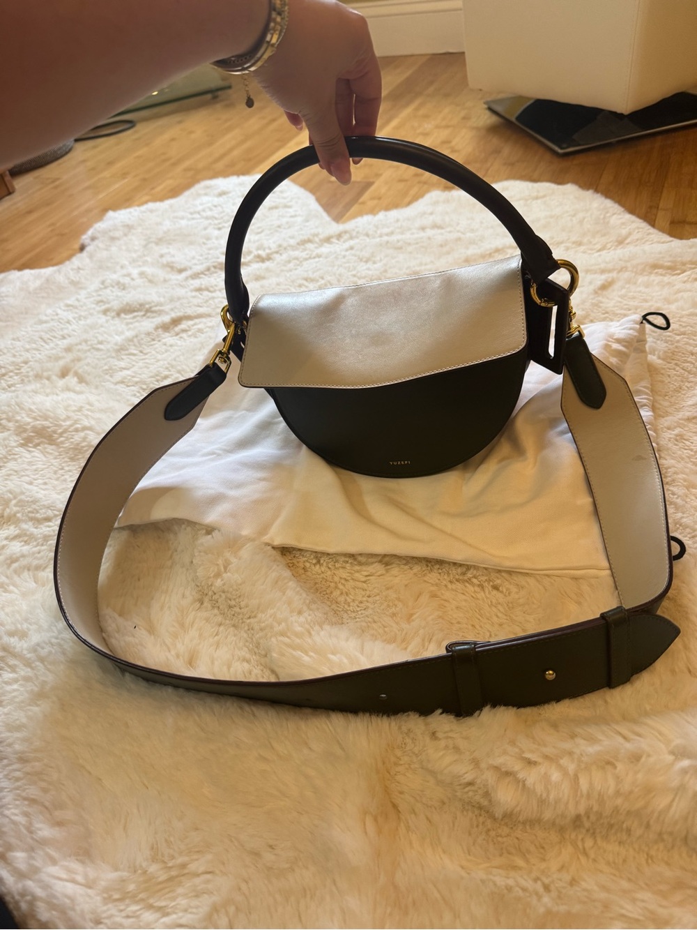 Yuzefi Black and Cream Curved Shoulder Bag with Wide Strap